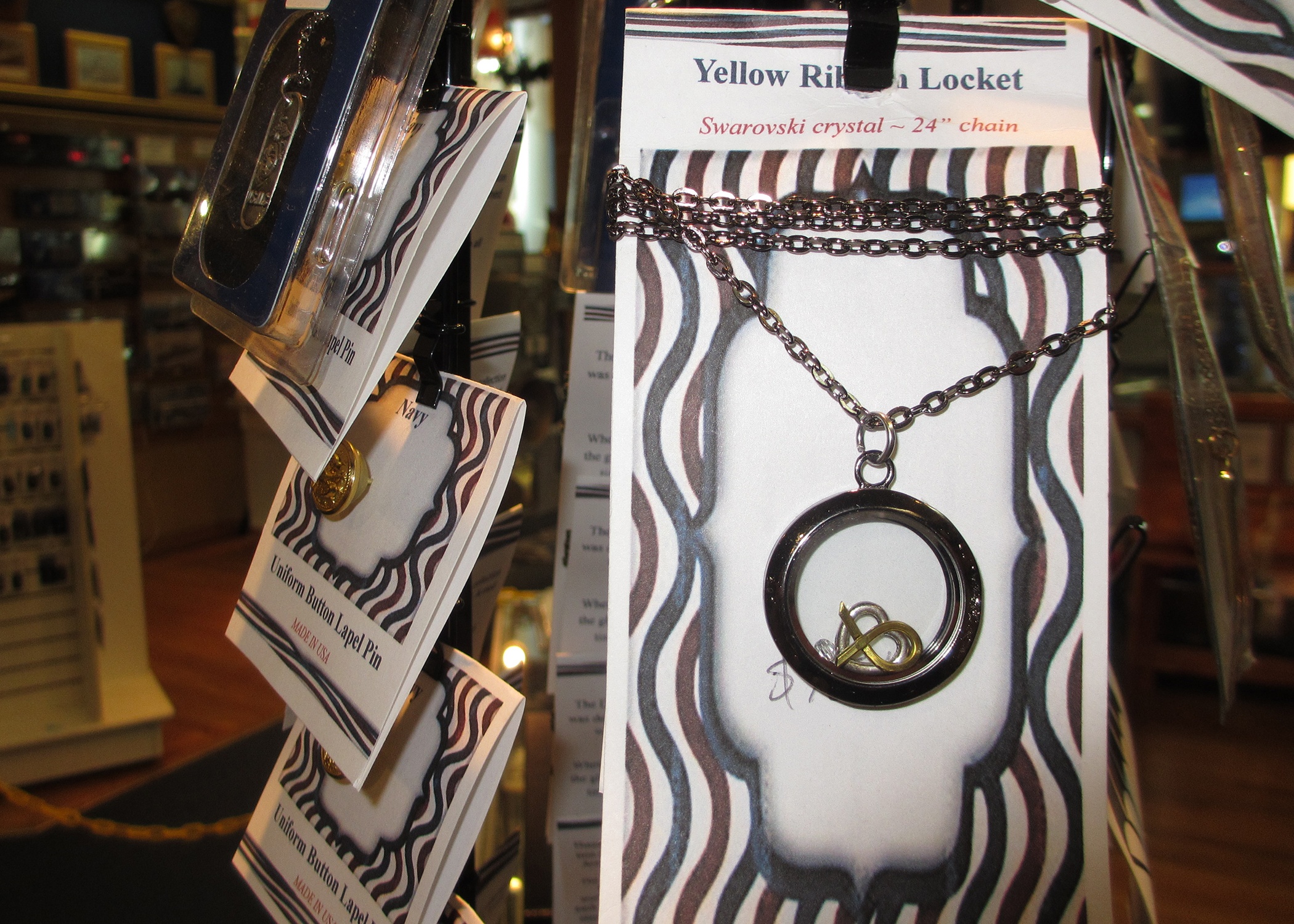 Mothers and wives will love a Yellow Ribbon Locket with a Swarovski crystal this Christmas. Stop by to see all of our military inspired jewelry. 